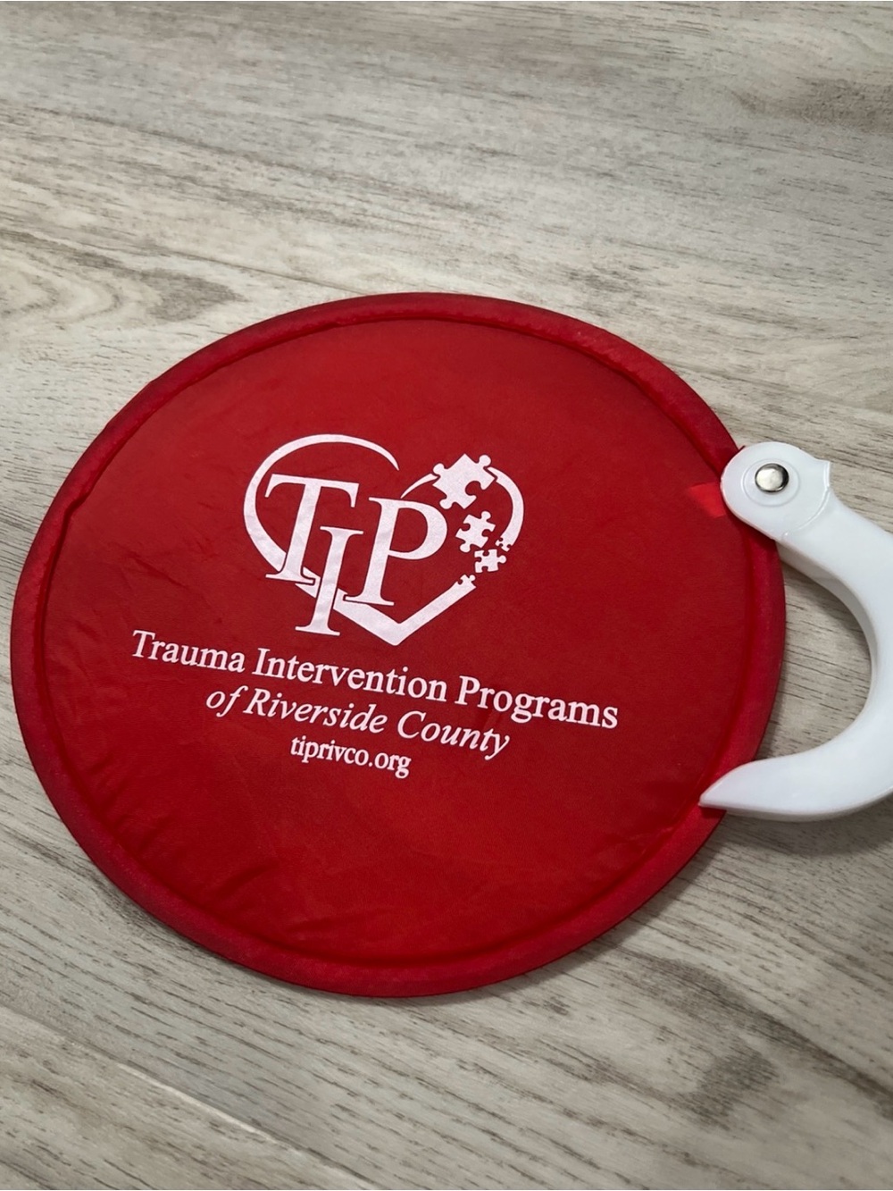 Trauma Intervention Programs Red Promotional Fan